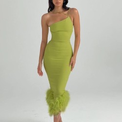 Asymmetrical green dress with fur