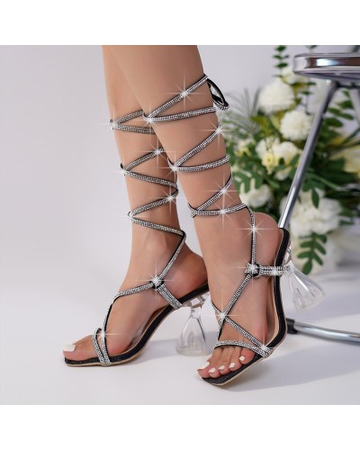 High sandals with crossed straps