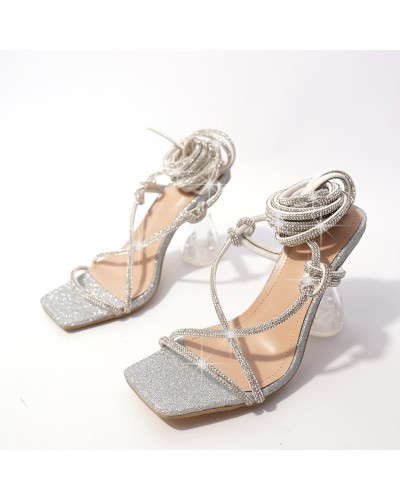 High sandals with crossed straps
