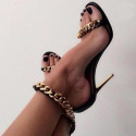 Heeled sandals with chain