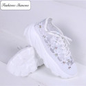 Clear flowery sneakers with diamonds