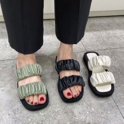 Green sandals with thick soles