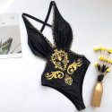 Black one piece swimsuit with gold print